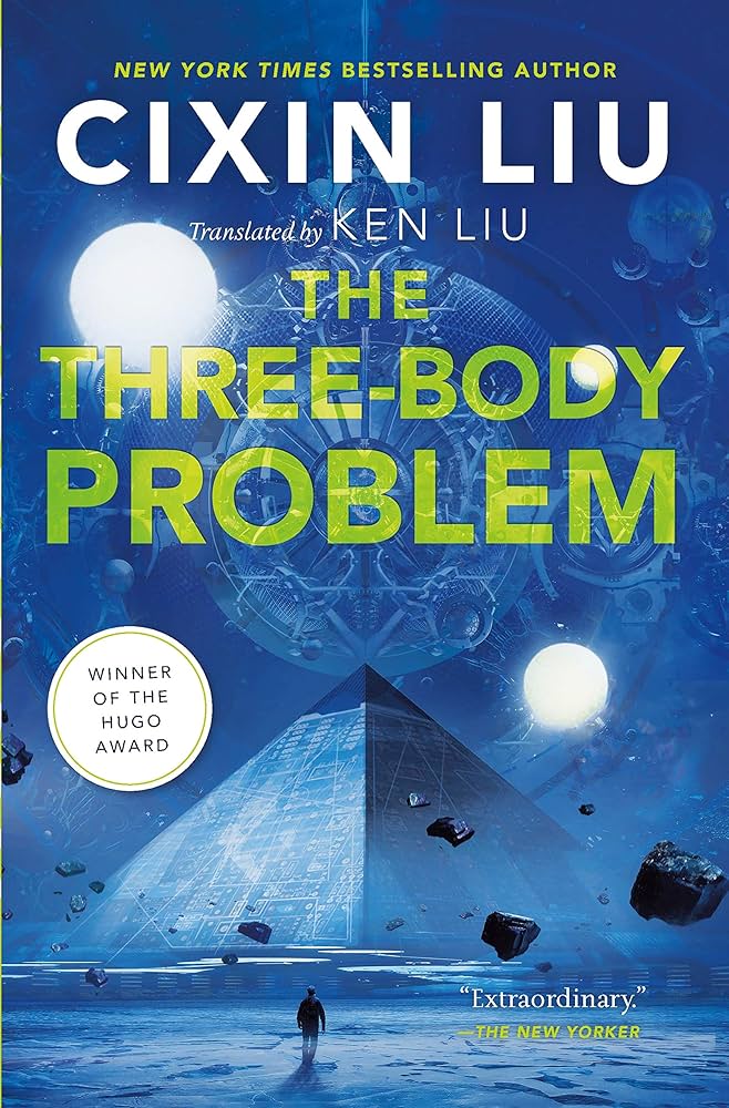 Book cover depicting an Egyptian pyramid beneath three suns