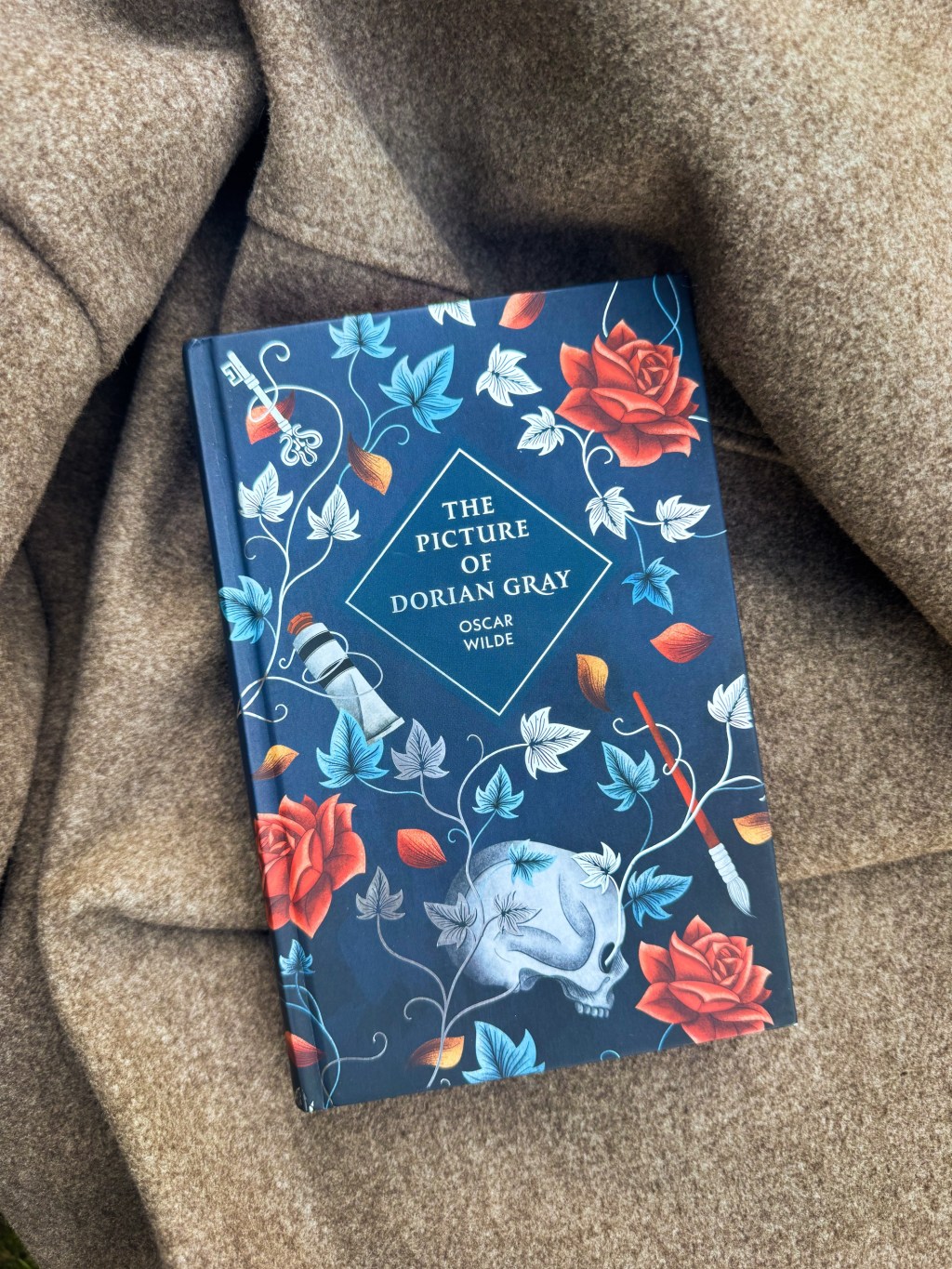 Book on brown fabric background